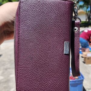 Al about the Benjamin's wallet purple